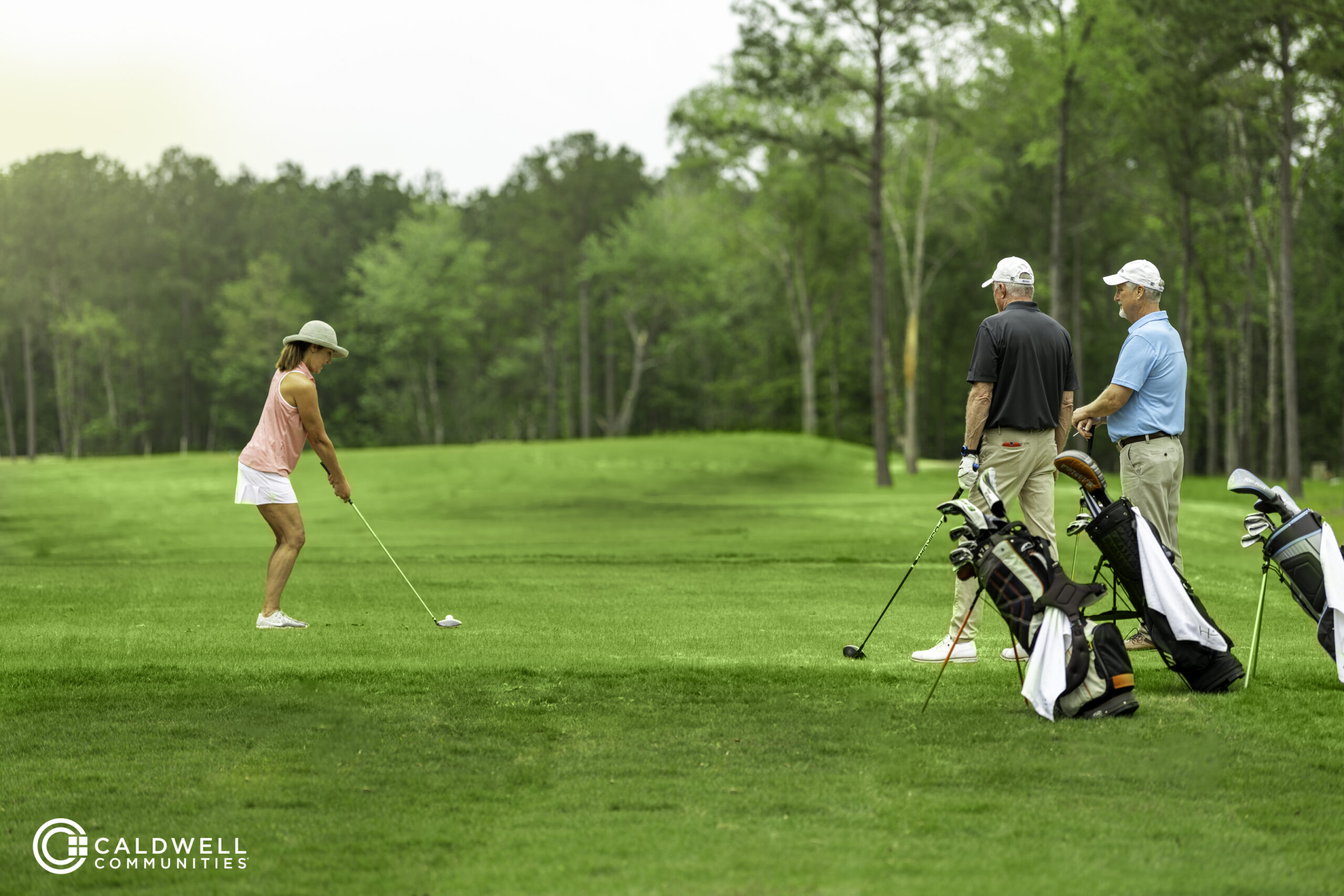 Highland Pines Golf Club The Highlands Porter, Texas Golfers about to tee off on one of the holes | Red Hawk Property Team powered by JLA Realty Jeremy Williams